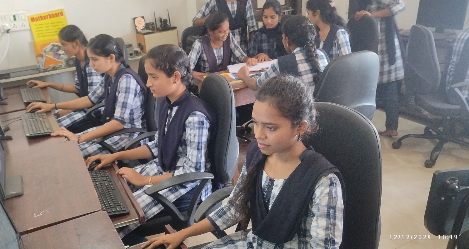 Students working at desktop computers in the Geetanjali computer laboratory