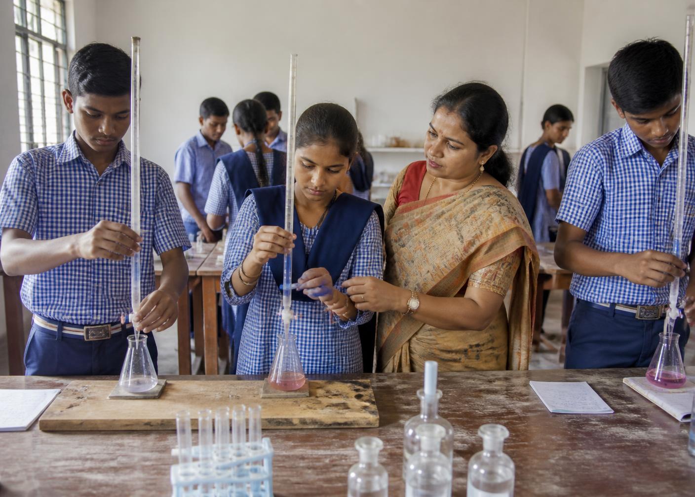 Students working at individual stations in the chemistry laboratory